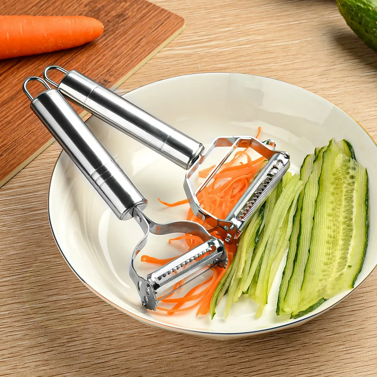 Edelstahl-Sparschäler mit glatter Klinge und Julienne-Wechselkopf